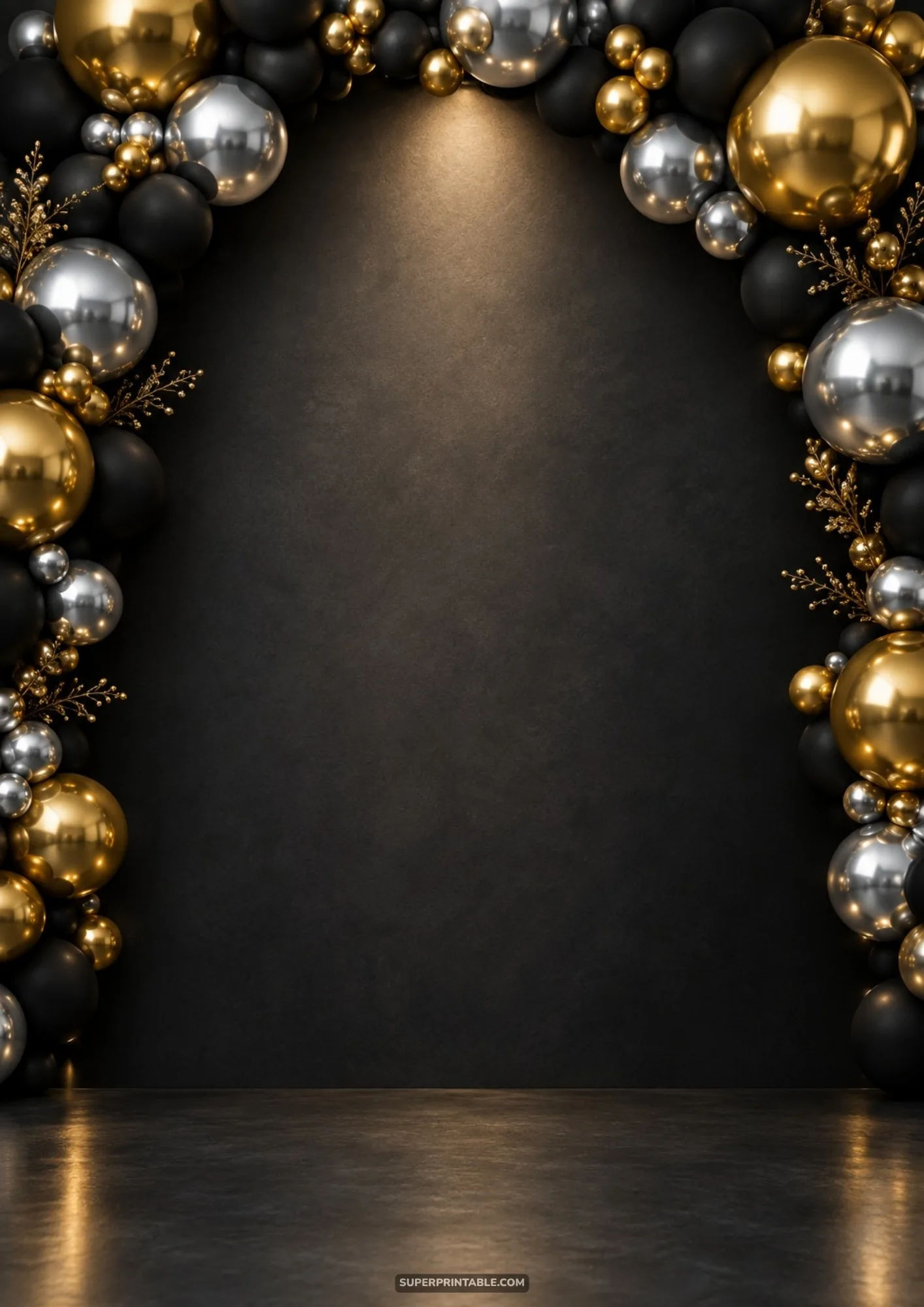 Black, gold, and chrome silver balloon arch framing an illuminated dark wall