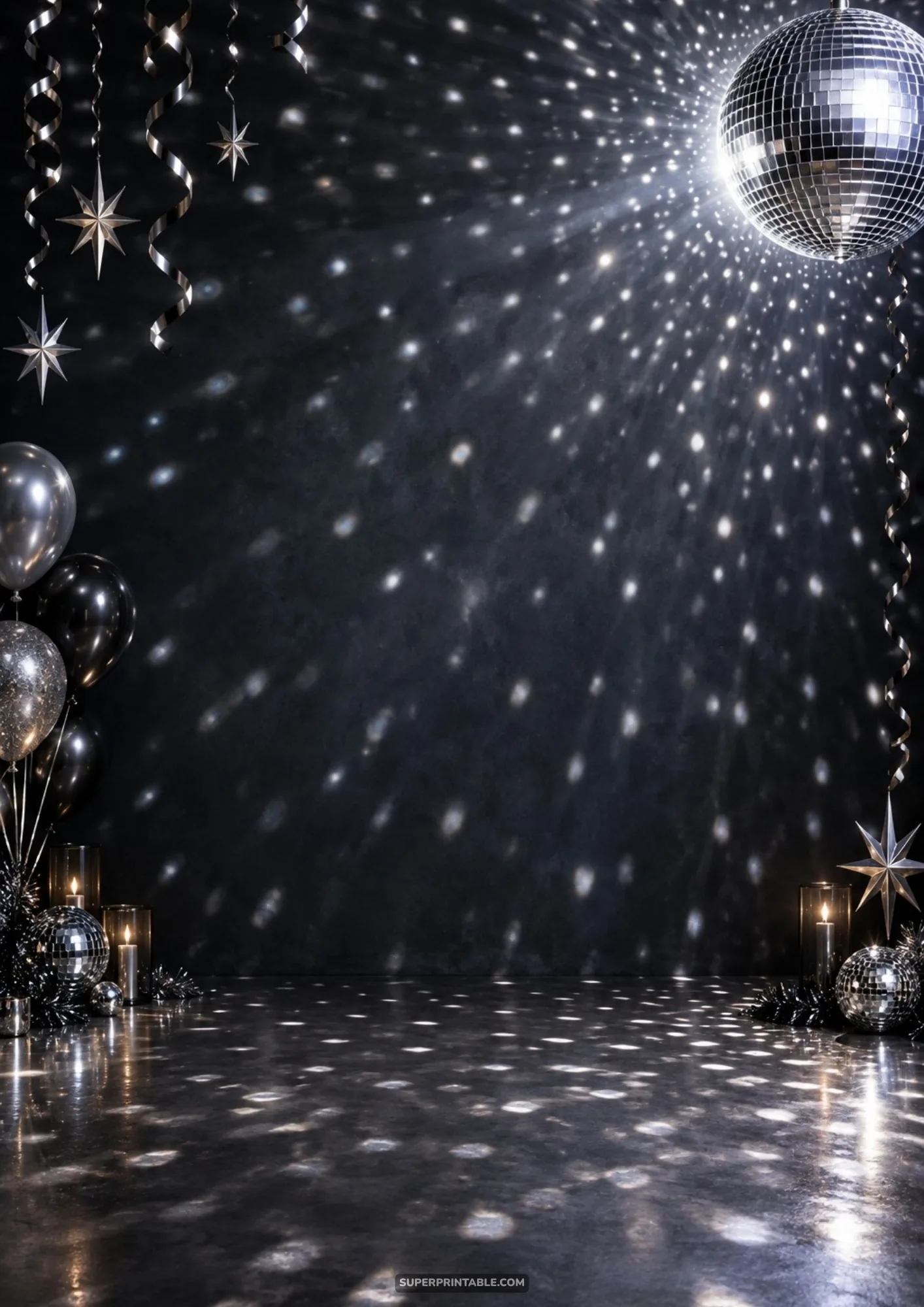 Overhead disco ball projecting light beams across black wall and metallic balloons