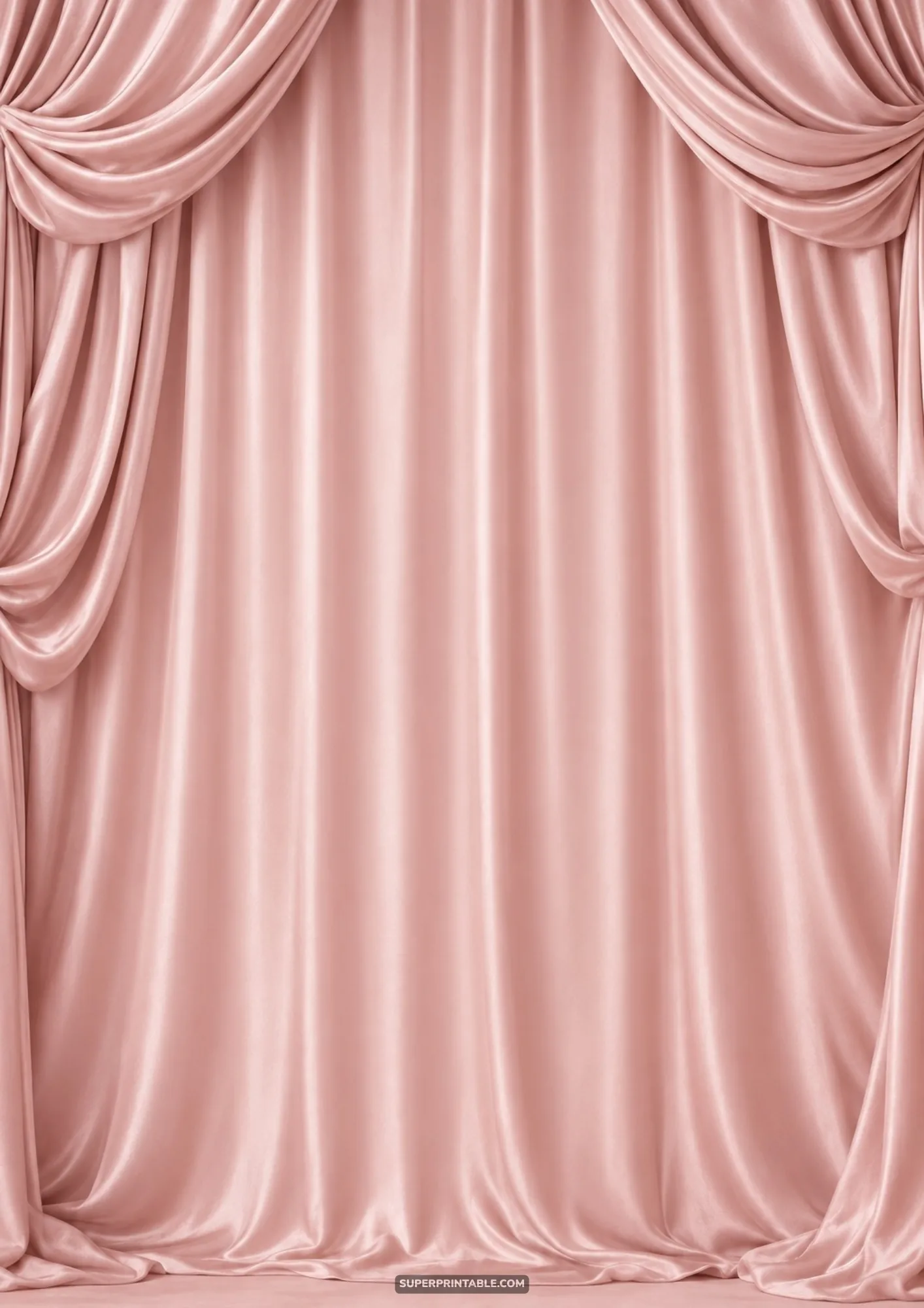 Draped dusty rose satin curtains with elegant swag valance forming an ornate stage frame