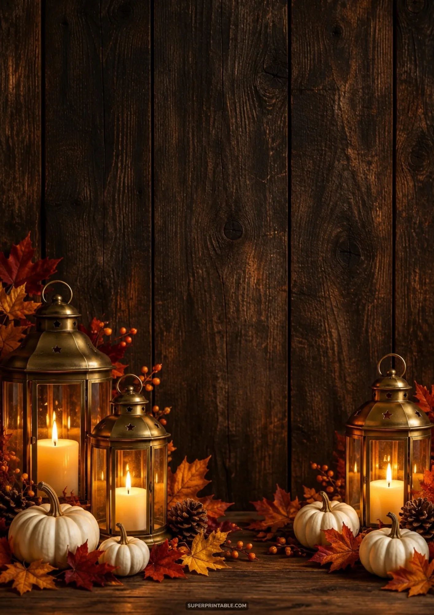 thanksgiving warm hearth backgrounds showing brass lanterns with glowing candles and white pumpkins on dark wood