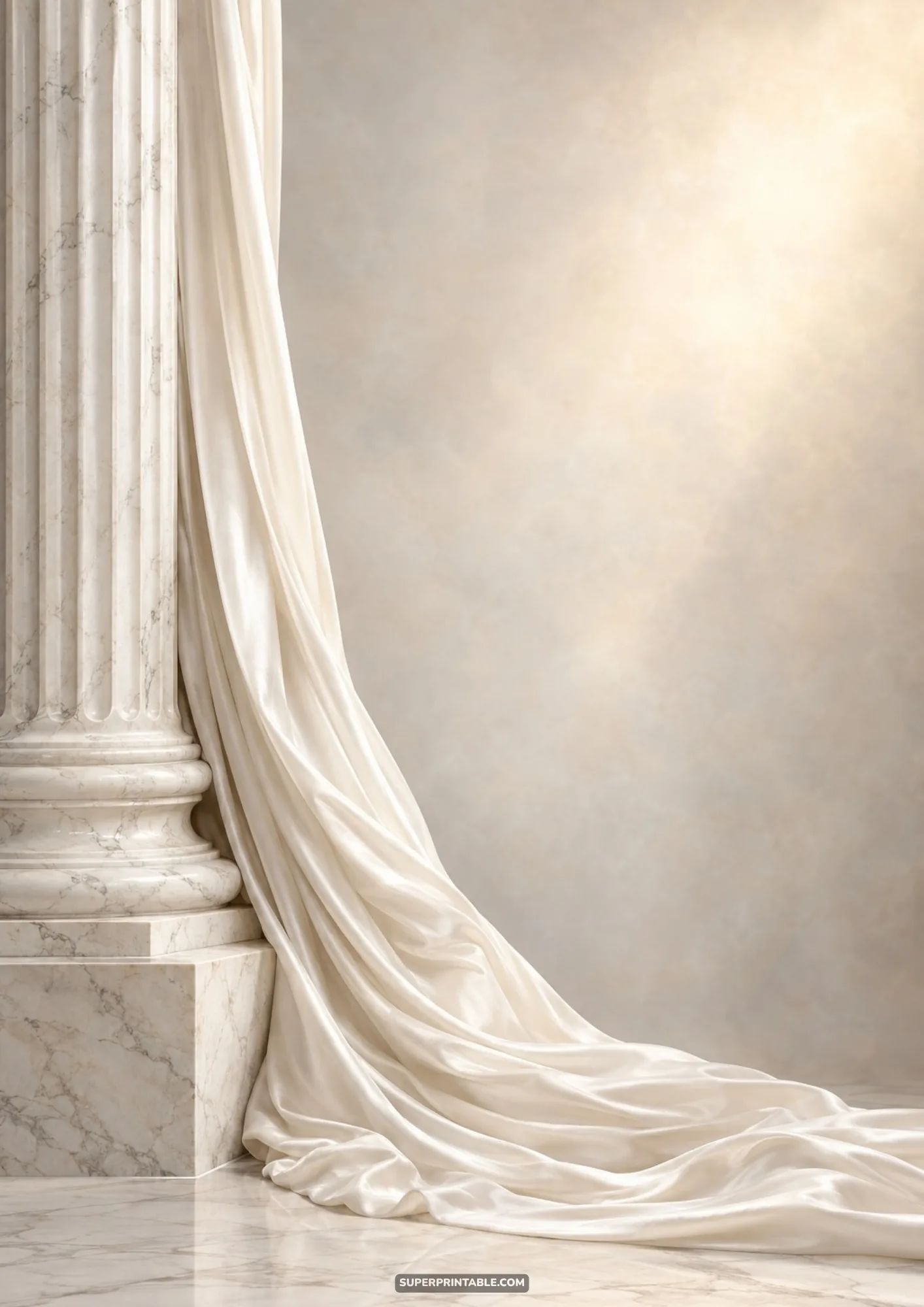Classical white marble column draped with cascading ivory satin fabric on a marble floor
