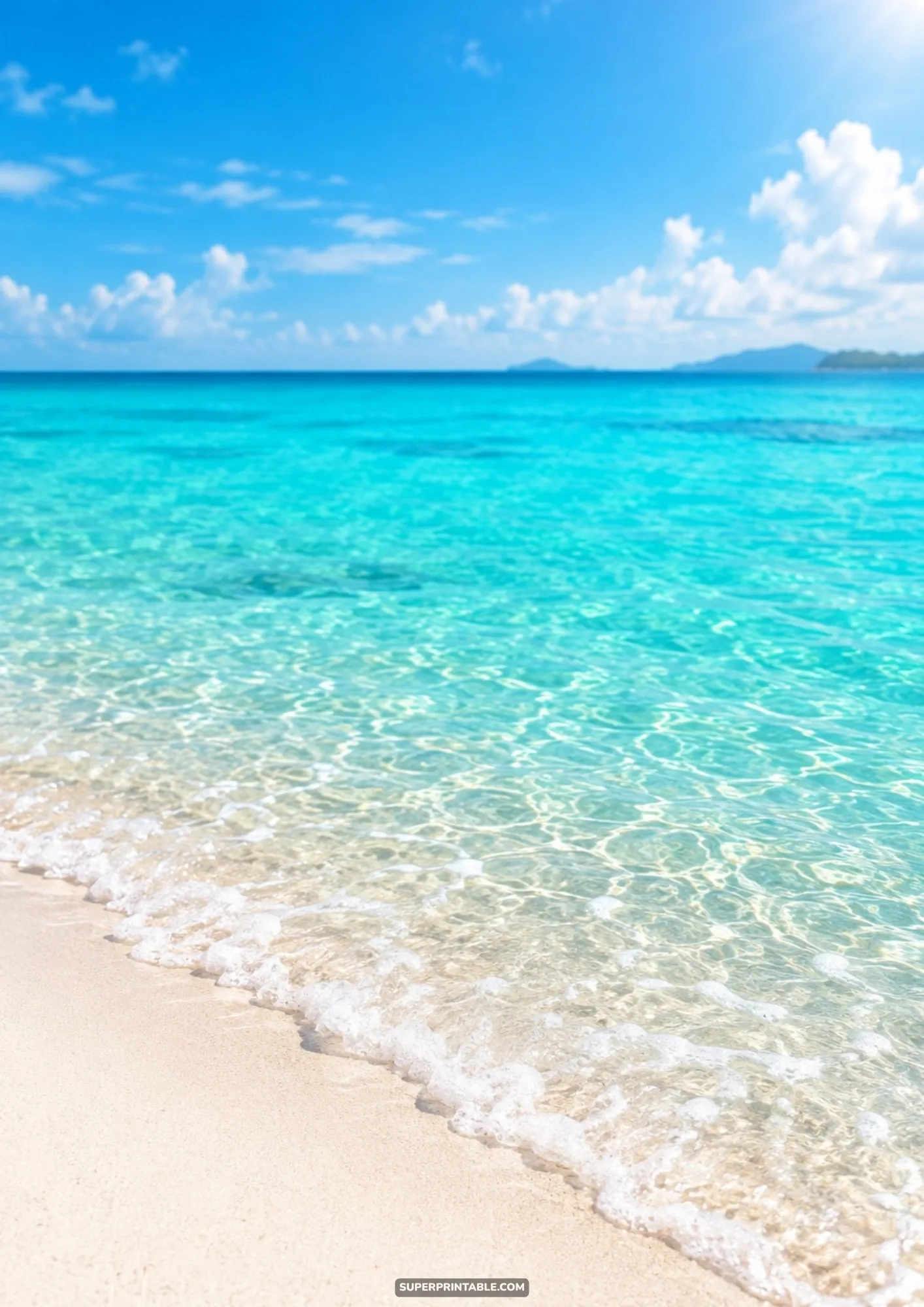Crystal clear turquoise ocean waters and soft white sandy beach shore