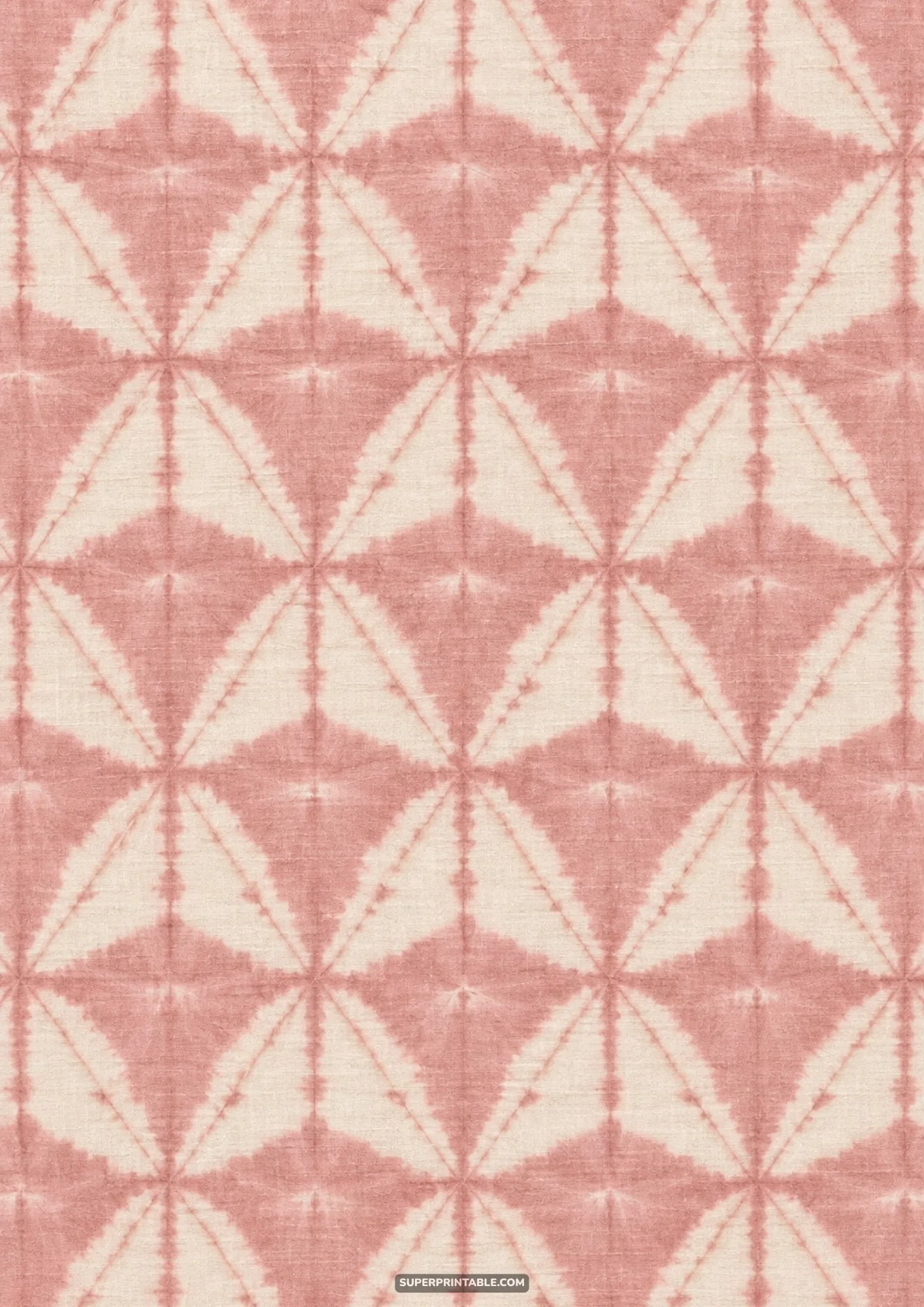 Dusty rose triangular shibori resist geometric motif folded and dyed on soft neutral cream fabric
