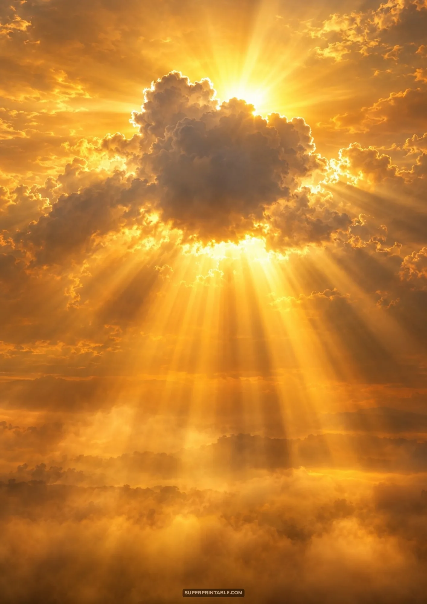 Vibrant golden hour sun bursting through a dark cloud with brilliant sunbeams over misty hills