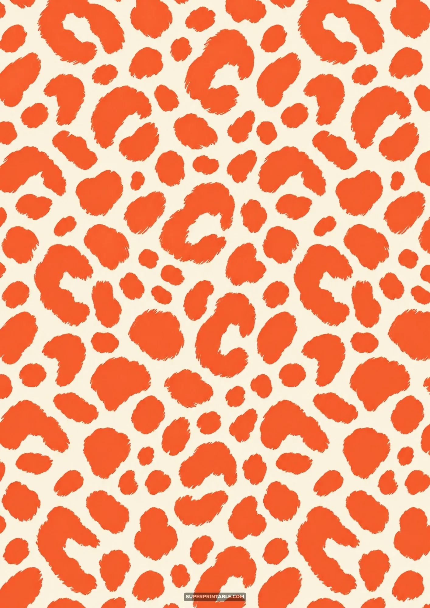 Textured orange cheetah and leopard spots scattered rhythmically across a light cream printable sheet.