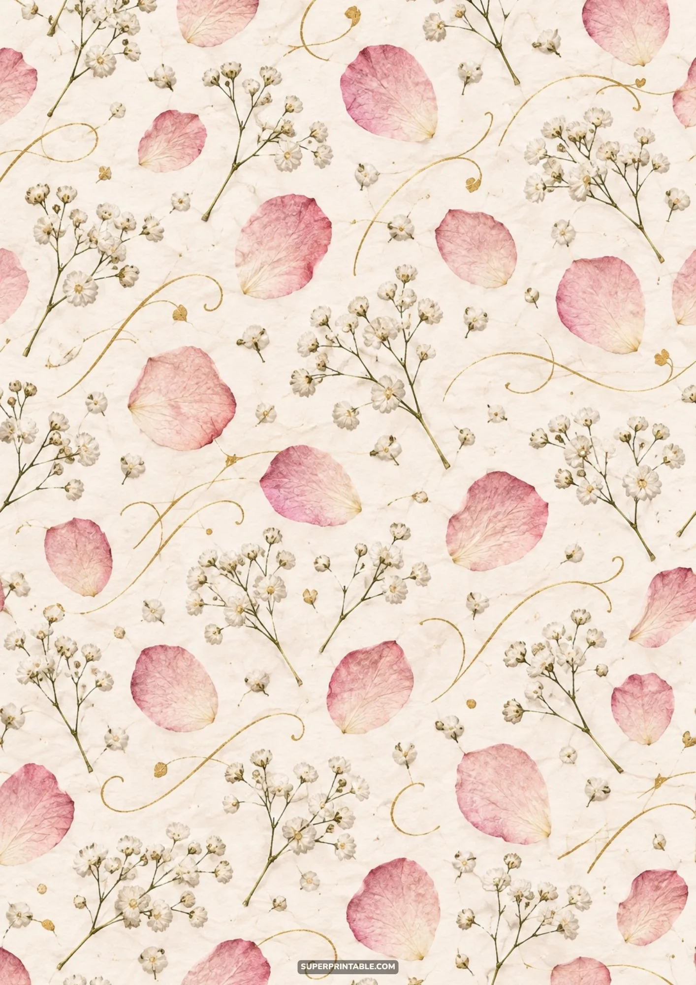 Pressed pink flower petals, delicate baby's breath sprigs, and fine gold filigree on textured paper