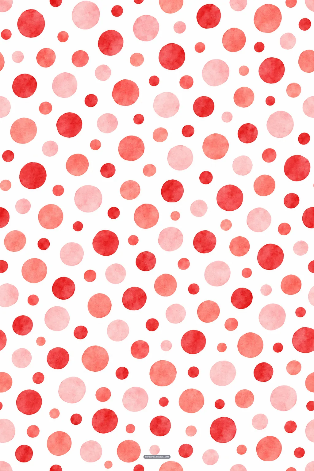Playful scattered watercolor polka dots in shades of red, coral, and blush pink