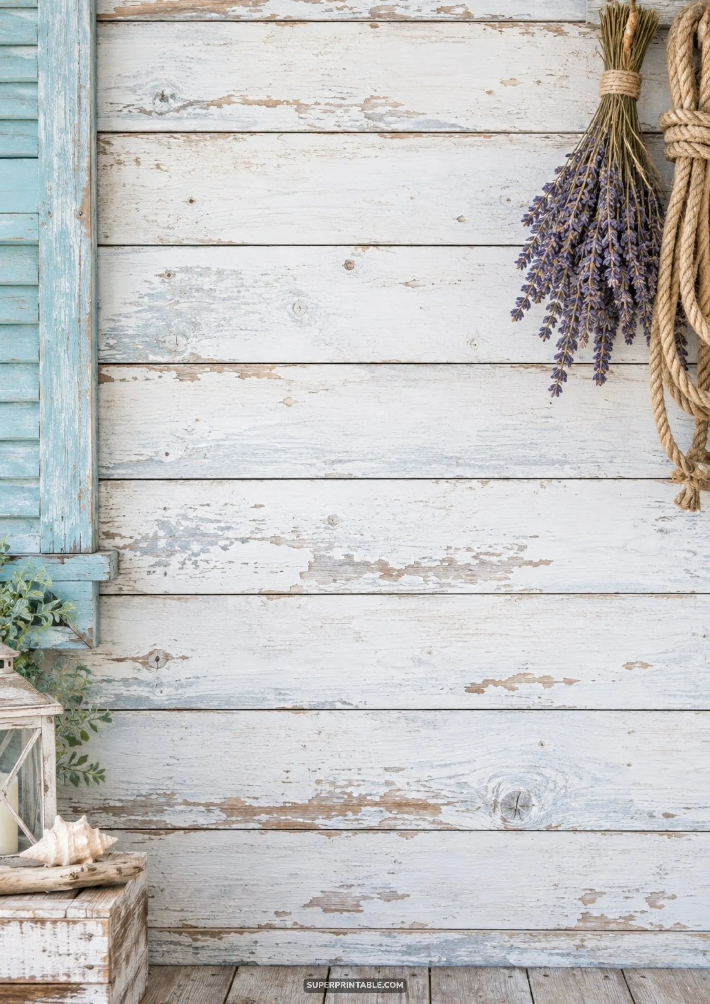 Rustic whitewashed wood wall with dried lavender bundle and coastal decor