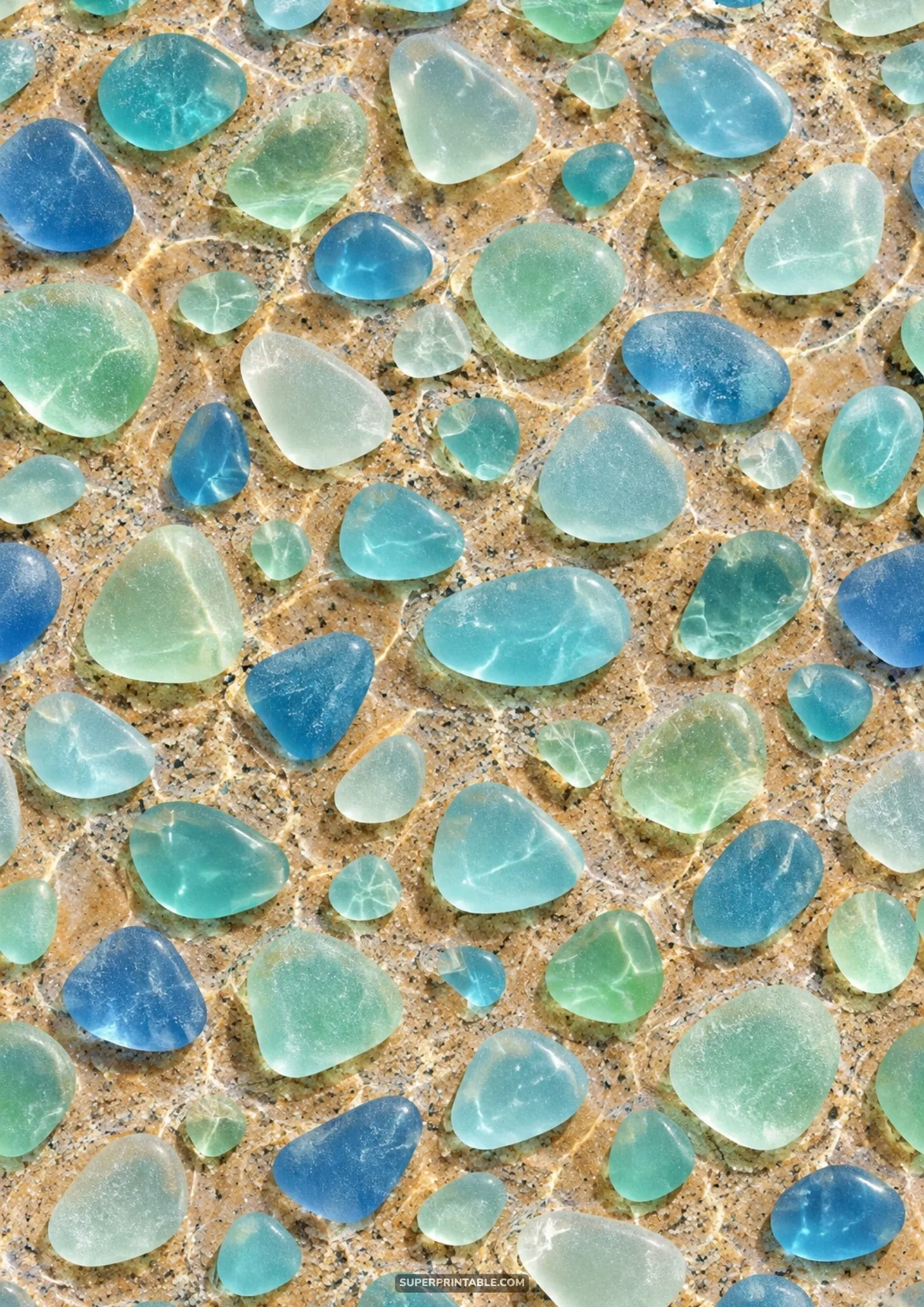 Smooth aqua and blue sea glass pebbles submerged in sunlit clear water
