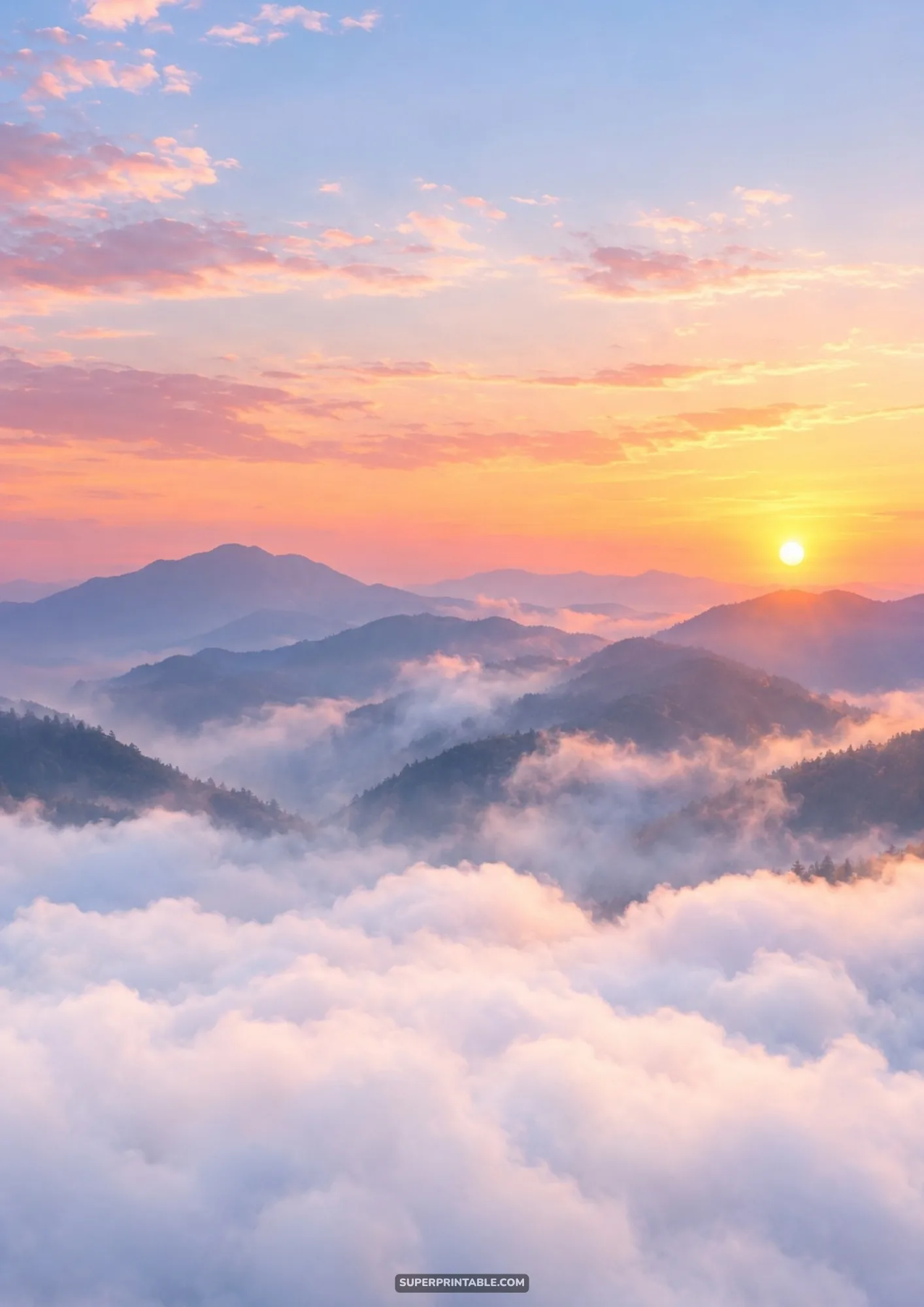 Vibrant sunrise over layered mountain peaks blanketed in rolling low clouds and valley fog